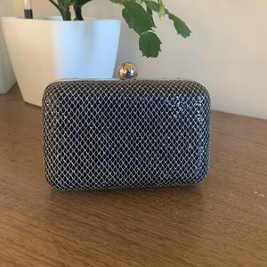 Bebe clam shell clutch